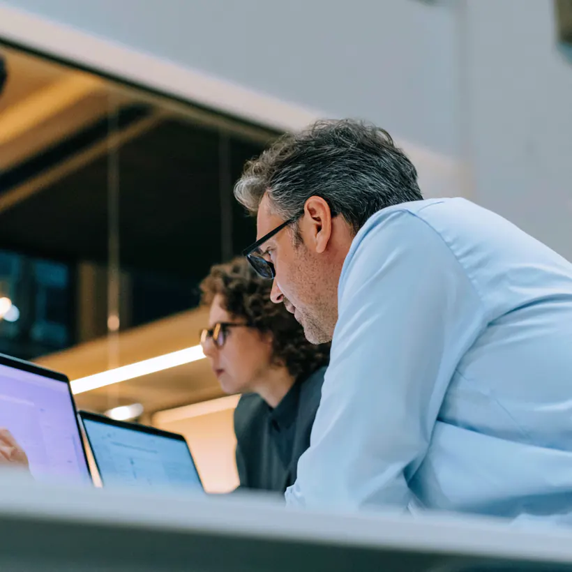Risk team reviewing information with Dyna.Ai